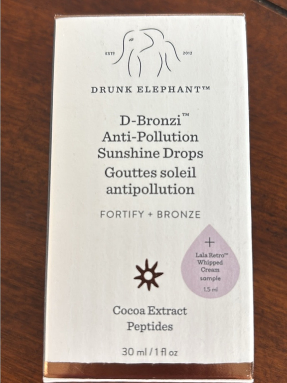 Drunk Elephant D-Bronzi Sunshine Drops - White & Bronze Accents